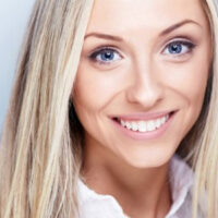 Woman Smiling New Patient